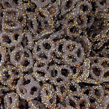 Chocolate-covered Harvest Pretzels with Nonpareils for Halloween
