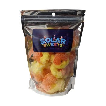 Freeze Dried Peach Rings packaged by Solar Sweets.
