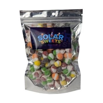 Freeze Dried Sour Skittles packaged by Solar Sweets. These rainbow candies are dehydrated with a light, crunchy texture and intense fruit flavors.