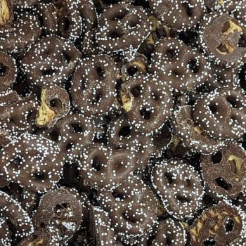 Milk Chocolate S'mores Graham Pretzels are milk chocolate covered graham cracker cookie pretzels, decorated with white nonpareils. 
